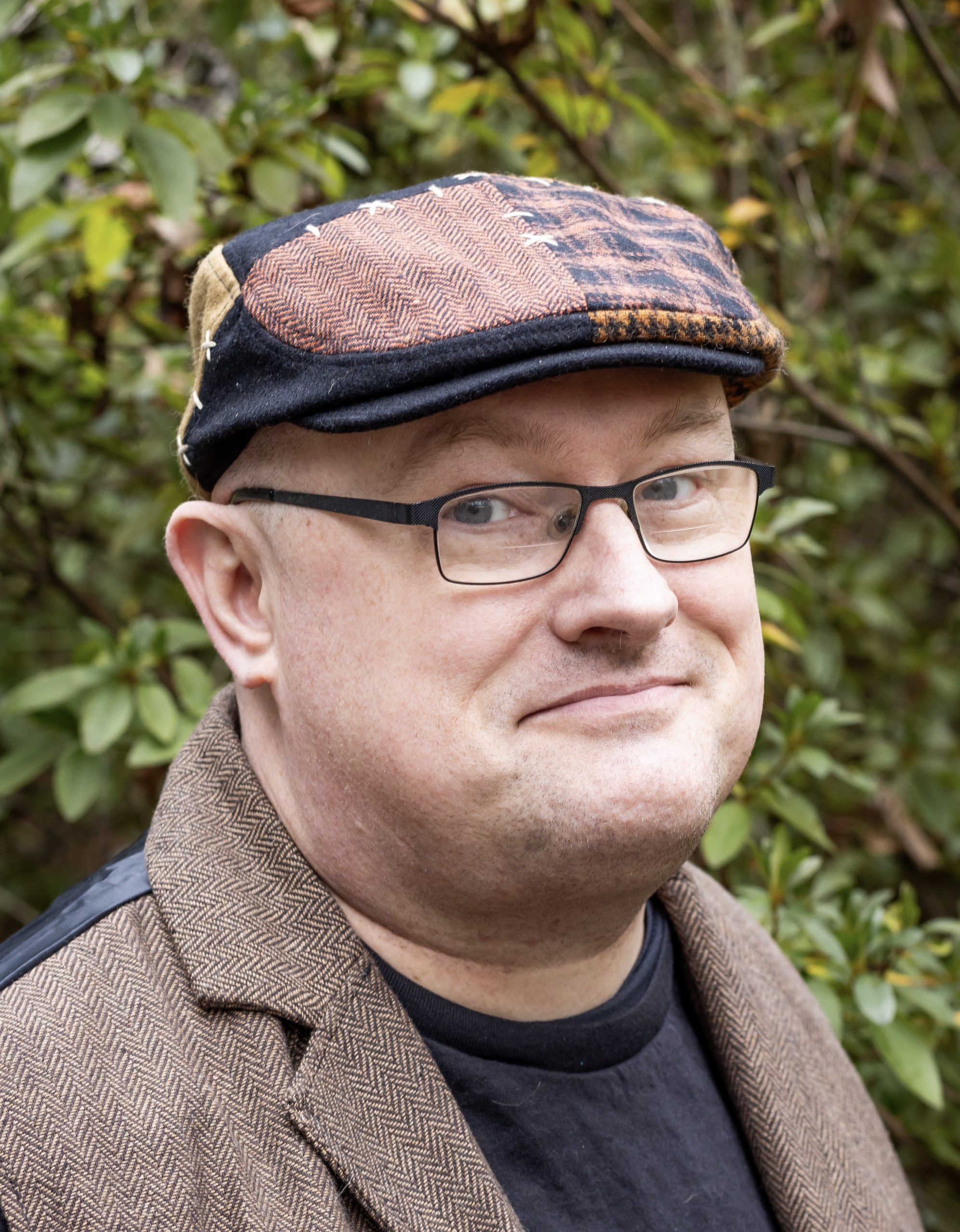 nerd with glasses and a hat